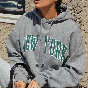 Brandy Melville John Galt Gray oversized hoodie with green New York lettering